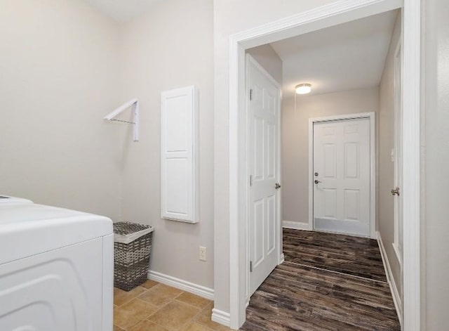 clothes washing area with washer / clothes dryer