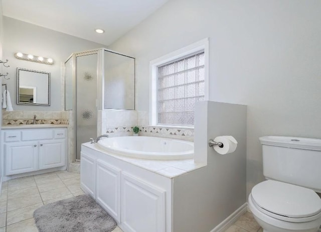 full bathroom with tile patterned flooring, vanity, plus walk in shower, and toilet