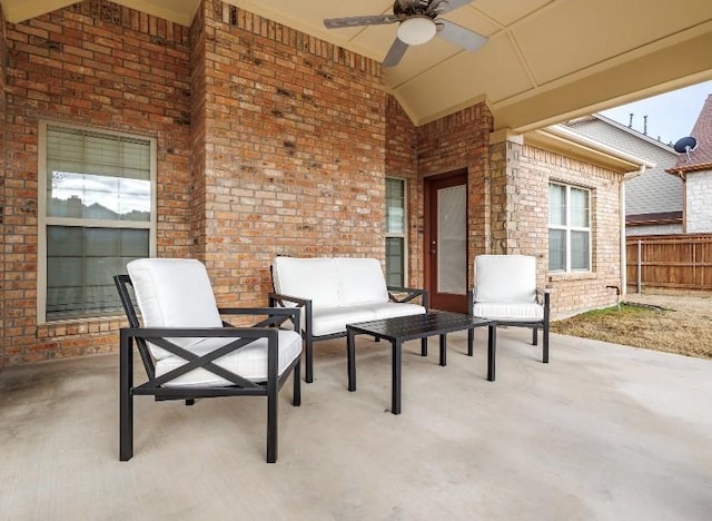 view of patio featuring an outdoor living space and ceiling fan