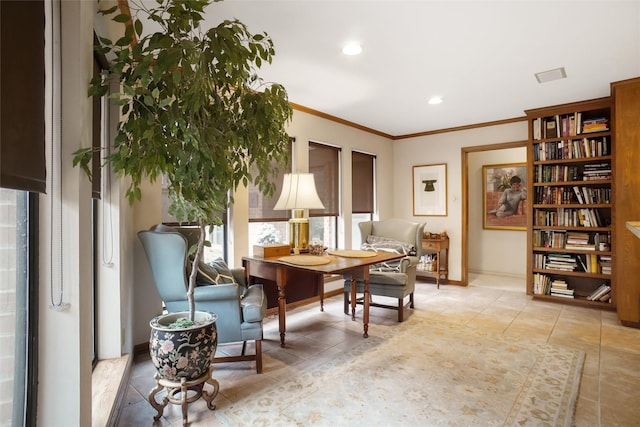 living area featuring light tile patterned floors and crown molding