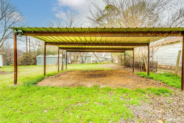 view of yard with a carport