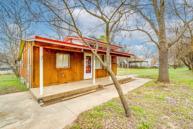 view of outdoor structure with fence