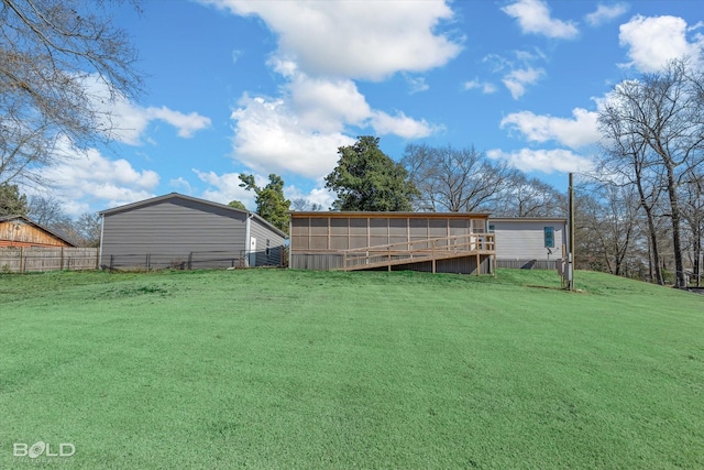 view of yard featuring a sunroom