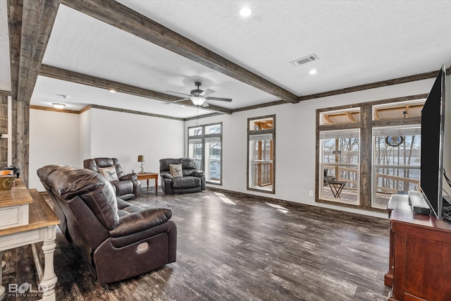 living room with ceiling fan, a textured ceiling, dark wood-type flooring, and beamed ceiling