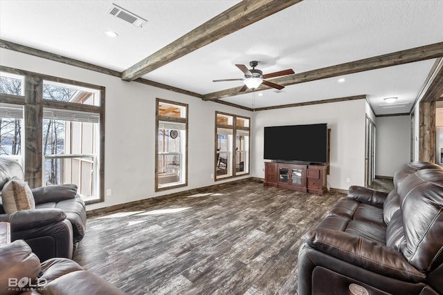 living room with beamed ceiling, ceiling fan, a textured ceiling, and dark hardwood / wood-style flooring