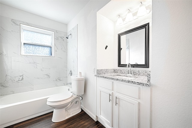 full bath with vanity, bathtub / shower combination, wood finished floors, and toilet