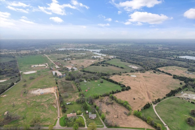 birds eye view of property with a rural view