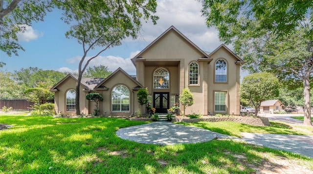 view of front of home with a front lawn