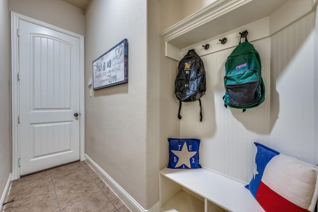 401 Devonshire Dr, Prosper, TX 75078 - mudroom with baseboards and light tile patterned floors