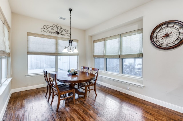 401 Devonshire Dr, Prosper, TX 75078 - dining room featuring a chandelier, dark wood-style floors, and baseboards