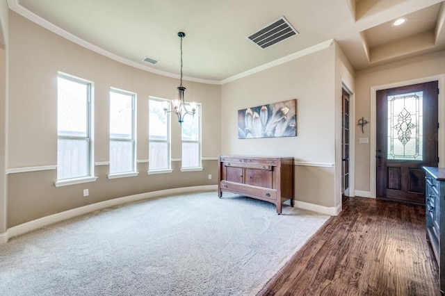 401 Devonshire Dr, Prosper, TX 75078 - entrance foyer with a chandelier, crown molding, and wood finished floors