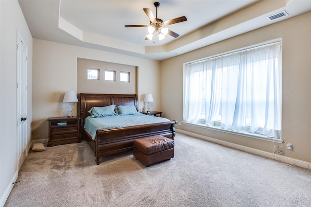 401 Devonshire Dr, Prosper, TX 75078 - carpeted bedroom featuring baseboards, a raised ceiling, and ceiling fan