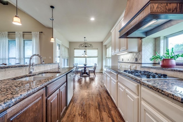 401 Devonshire Dr, Prosper, TX 75078 - kitchen featuring stainless steel appliances, custom range hood, dark wood-type flooring, decorative backsplash, and dark stone countertops