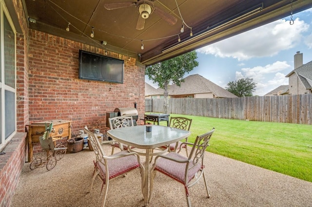 401 Devonshire Dr, Prosper, TX 75078 - fenced backyard with outdoor dining area, ceiling fan, a patio, and a grill