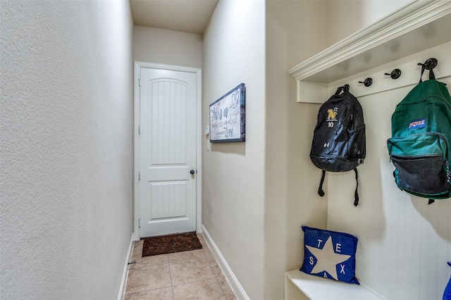 401 Devonshire Dr, Prosper, TX 75078 - mudroom featuring baseboards and light tile patterned flooring