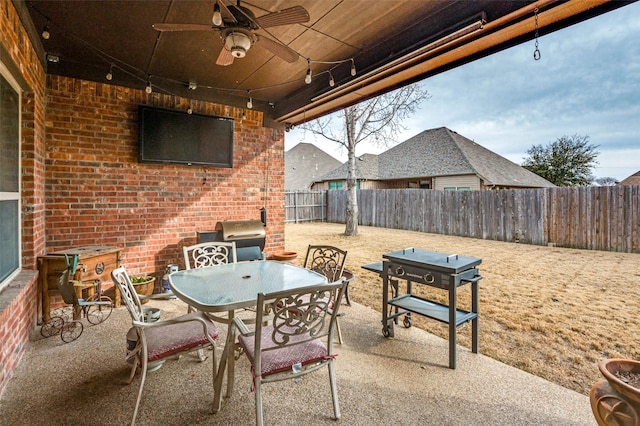 401 Devonshire Dr, Prosper, TX 75078 - fenced backyard with ceiling fan, a patio, and outdoor dining area