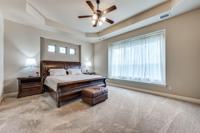 401 Devonshire Dr, Prosper, TX 75078 - carpeted bedroom featuring a raised ceiling and ceiling fan