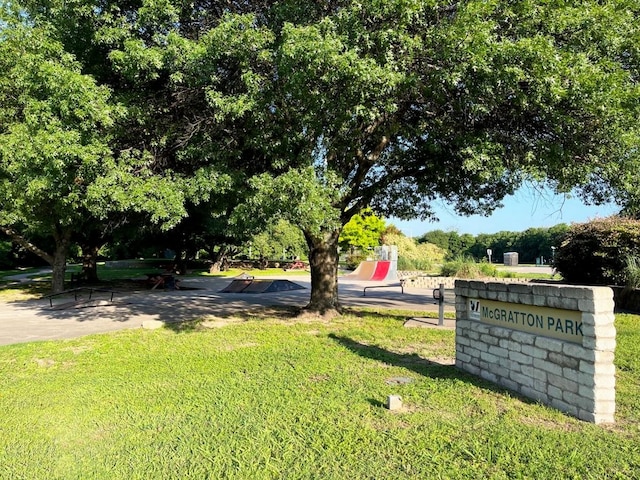 view of community featuring a lawn