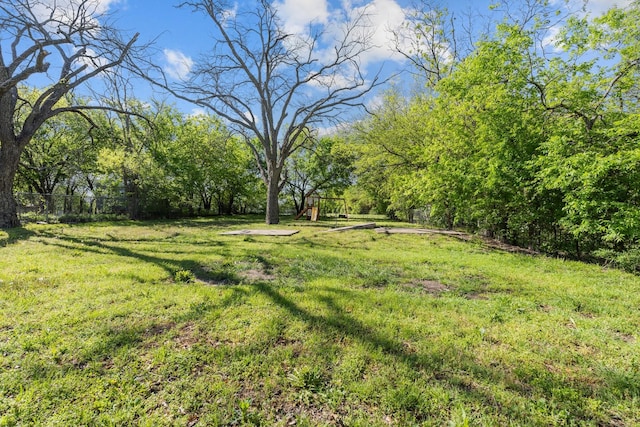 119 Wheeler St, Weatherford, TX 76086 - view of yard with fence and a playground
