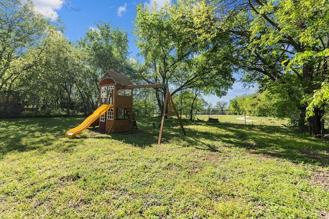 119 Wheeler St, Weatherford, TX 76086 - view of jungle gym with a yard and fence