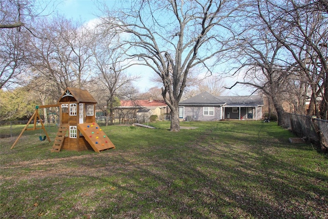 119 Wheeler St, Weatherford, TX 76086 - view of yard featuring a fenced backyard and a playground