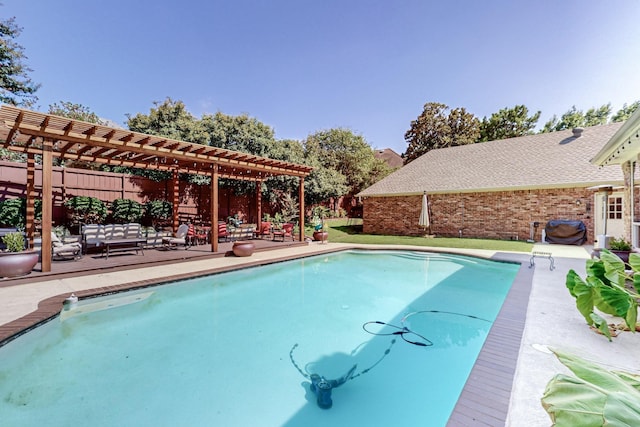 view of swimming pool with an outdoor hangout area, a pergola, and a patio area