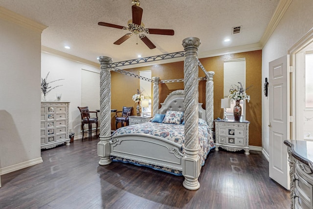 bedroom featuring dark hardwood / wood-style flooring, ceiling fan, ornamental molding, and a textured ceiling