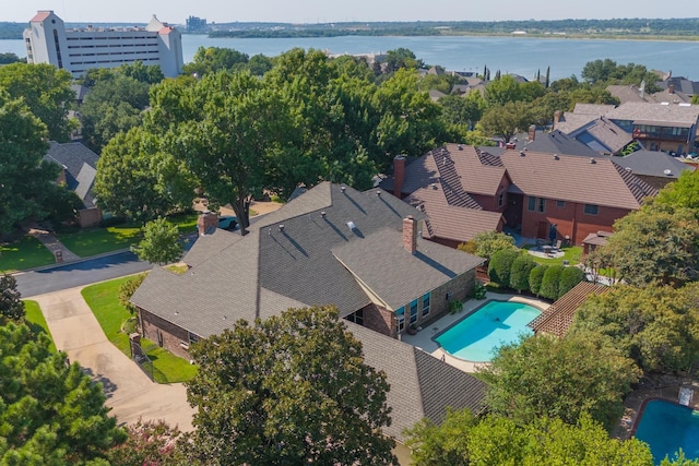 birds eye view of property featuring a water view