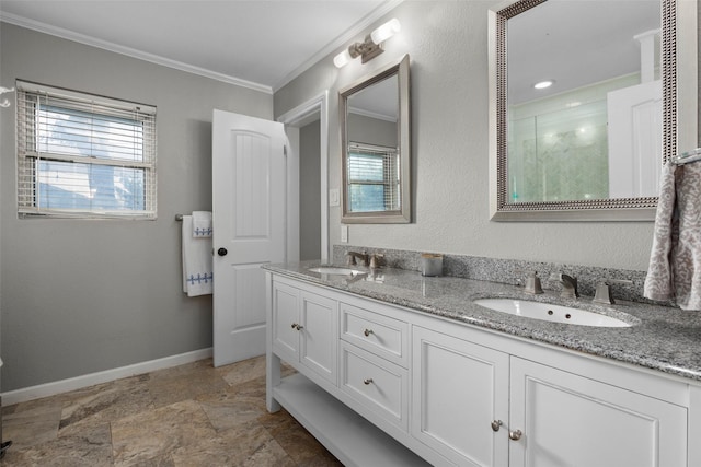 bathroom with walk in shower, ornamental molding, vanity, and plenty of natural light