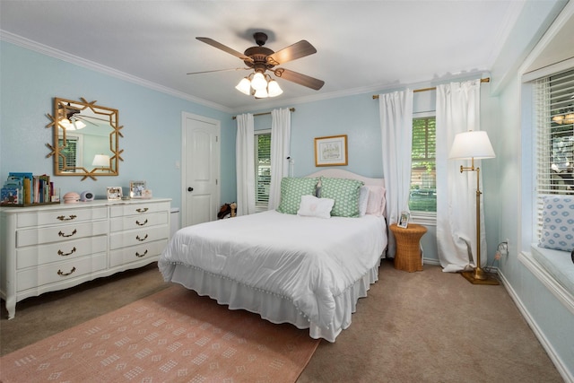 bedroom with ornamental molding, carpet, and ceiling fan