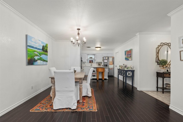 dining space featuring an inviting chandelier, crown molding, and dark wood-type flooring