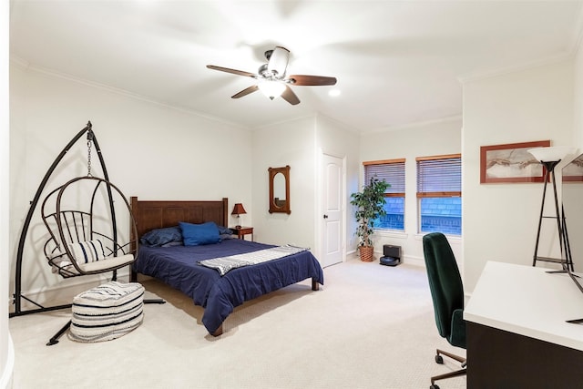 bedroom with ornamental molding, light colored carpet, and ceiling fan