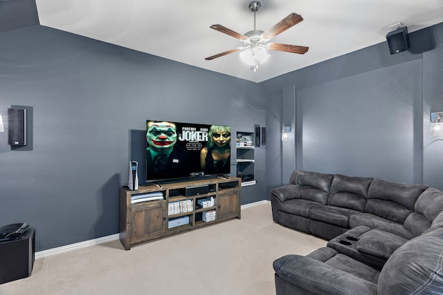 living room with ceiling fan and light colored carpet