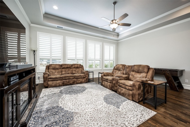 3316 Dovehill Dr, Northlake, TX 76247 - living room featuring a tray ceiling, ceiling fan, dark wood-type flooring, ornamental molding, and baseboards