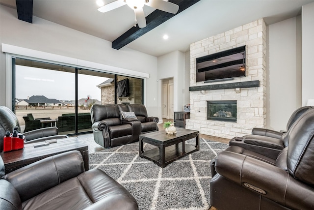 3316 Dovehill Dr, Northlake, TX 76247 - living area featuring beam ceiling, ceiling fan, and a stone fireplace