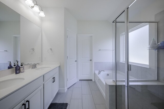 laundry area featuring hardwood / wood-style flooring and separate washer and dryer