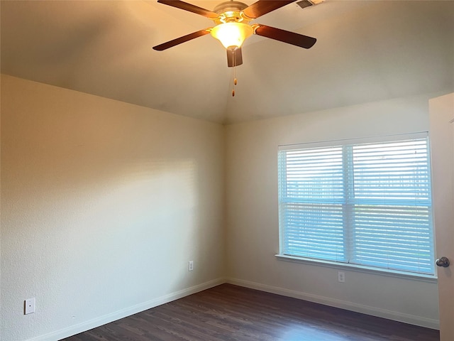 unfurnished room with lofted ceiling, dark wood-type flooring, and ceiling fan