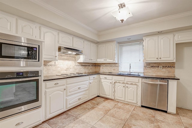 kitchen featuring sink, crown molding, white cabinets, and appliances with stainless steel finishes