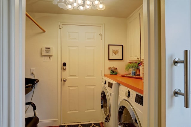 washroom with separate washer and dryer