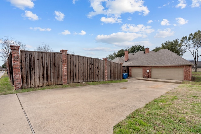 exterior space featuring a garage