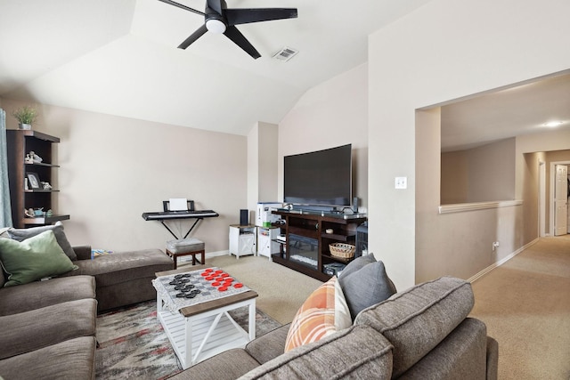 living room with light carpet, vaulted ceiling, and ceiling fan