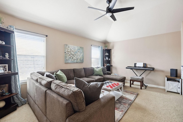 living room with lofted ceiling, carpet floors, and ceiling fan