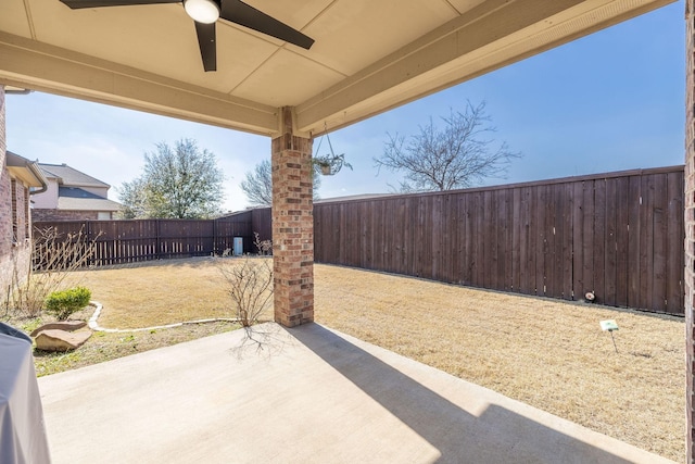 view of patio featuring ceiling fan