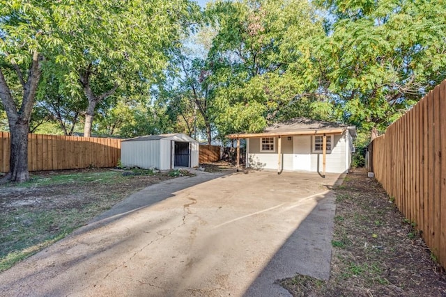 exterior space featuring a storage unit