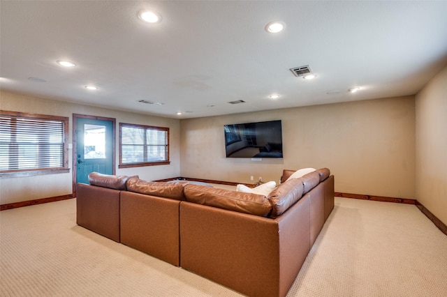 living room featuring light carpet