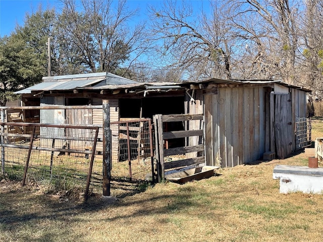 view of outbuilding featuring an exterior structure and an outdoor structure