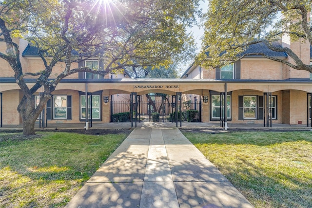 view of front facade with a front lawn