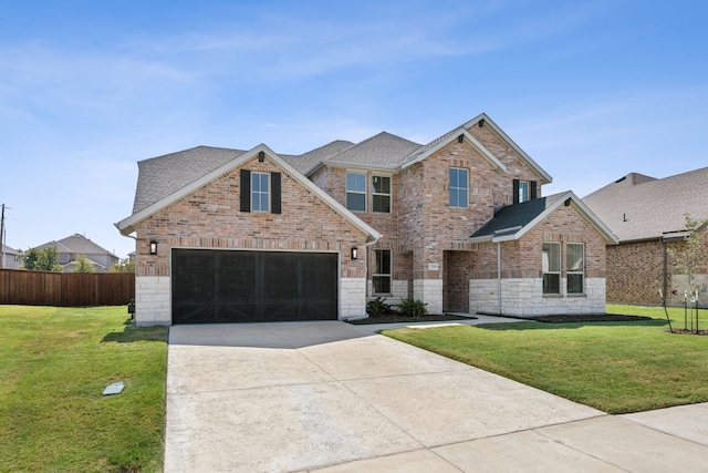 1209 Xeresa Dr, Little Elm, TX 75068 - view of front of house with concrete driveway, roof with shingles, and brick siding