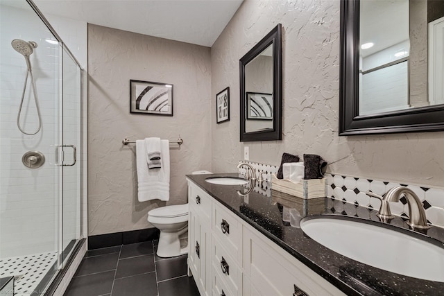 full bathroom with a sink and a stall shower