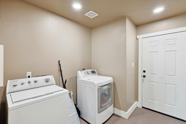 washroom with washer and clothes dryer